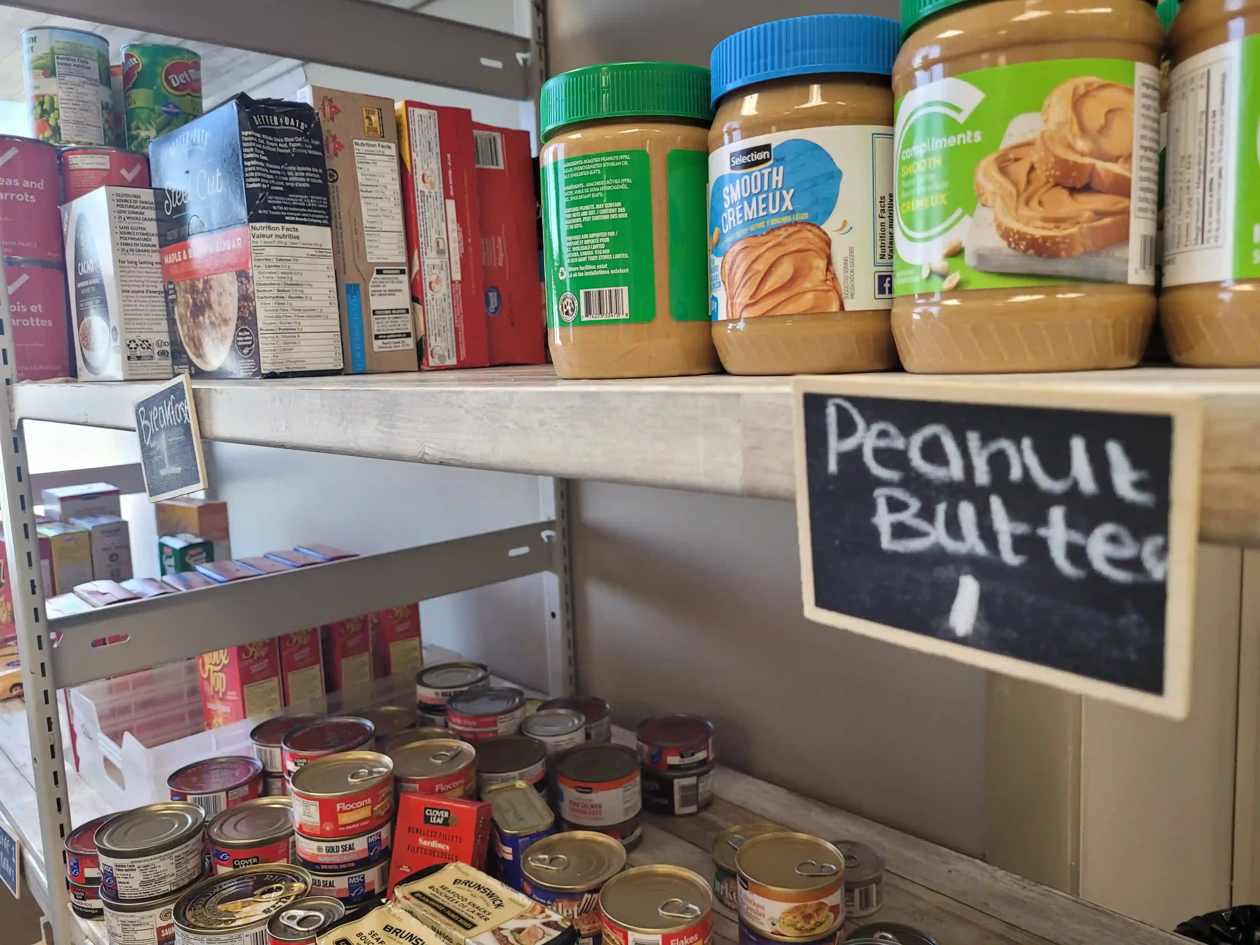 Peanut butter is displayed on the shelf